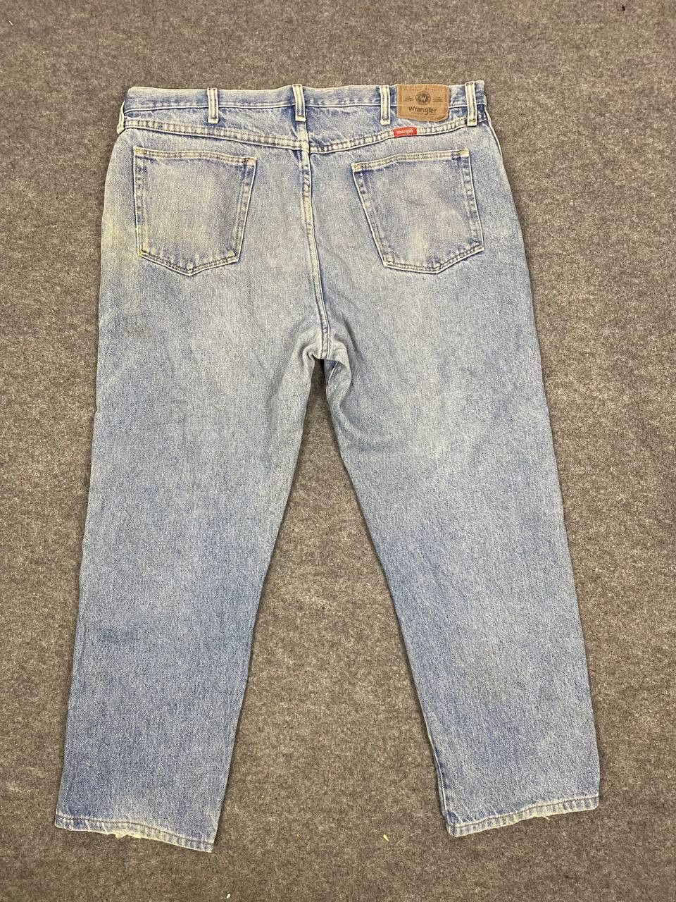 image of Wrangler Relaxed Fit Distressed Denim in Light Blue, Men's (Size 40)
