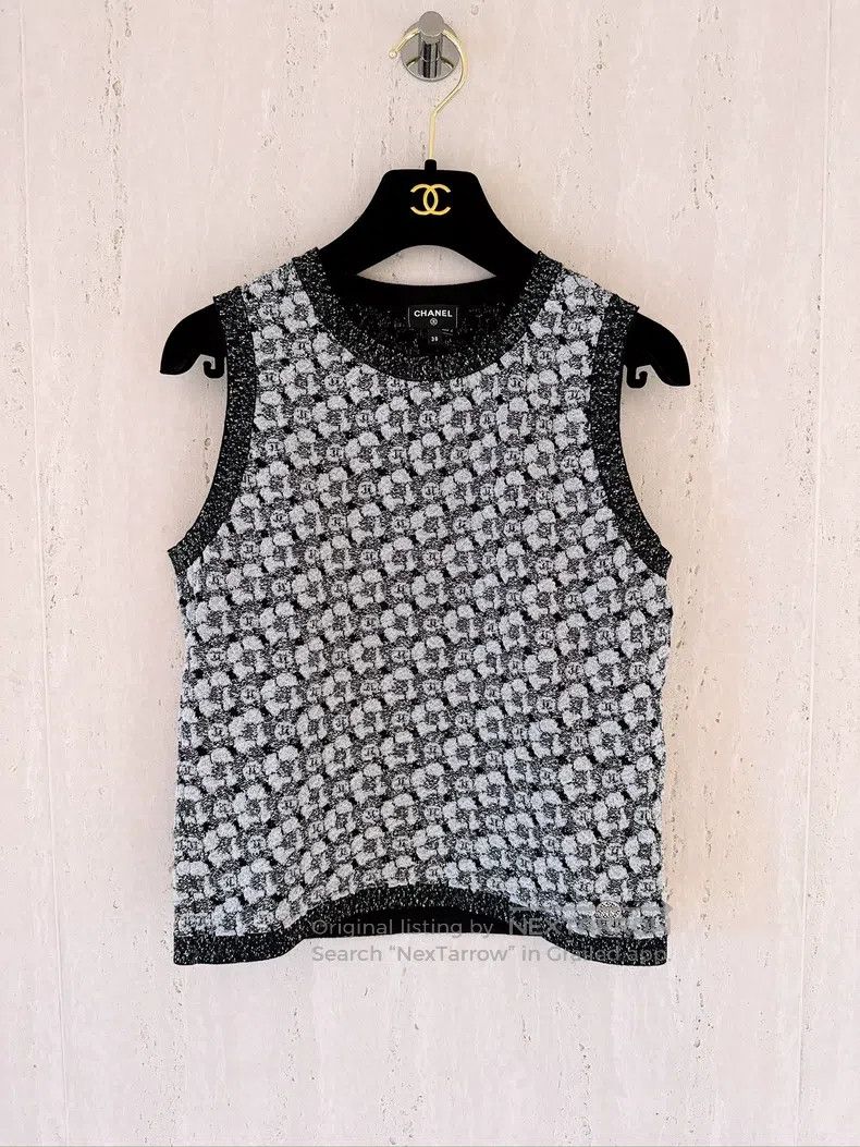 Chanel 23K autumn and winter black and silver camelia knit