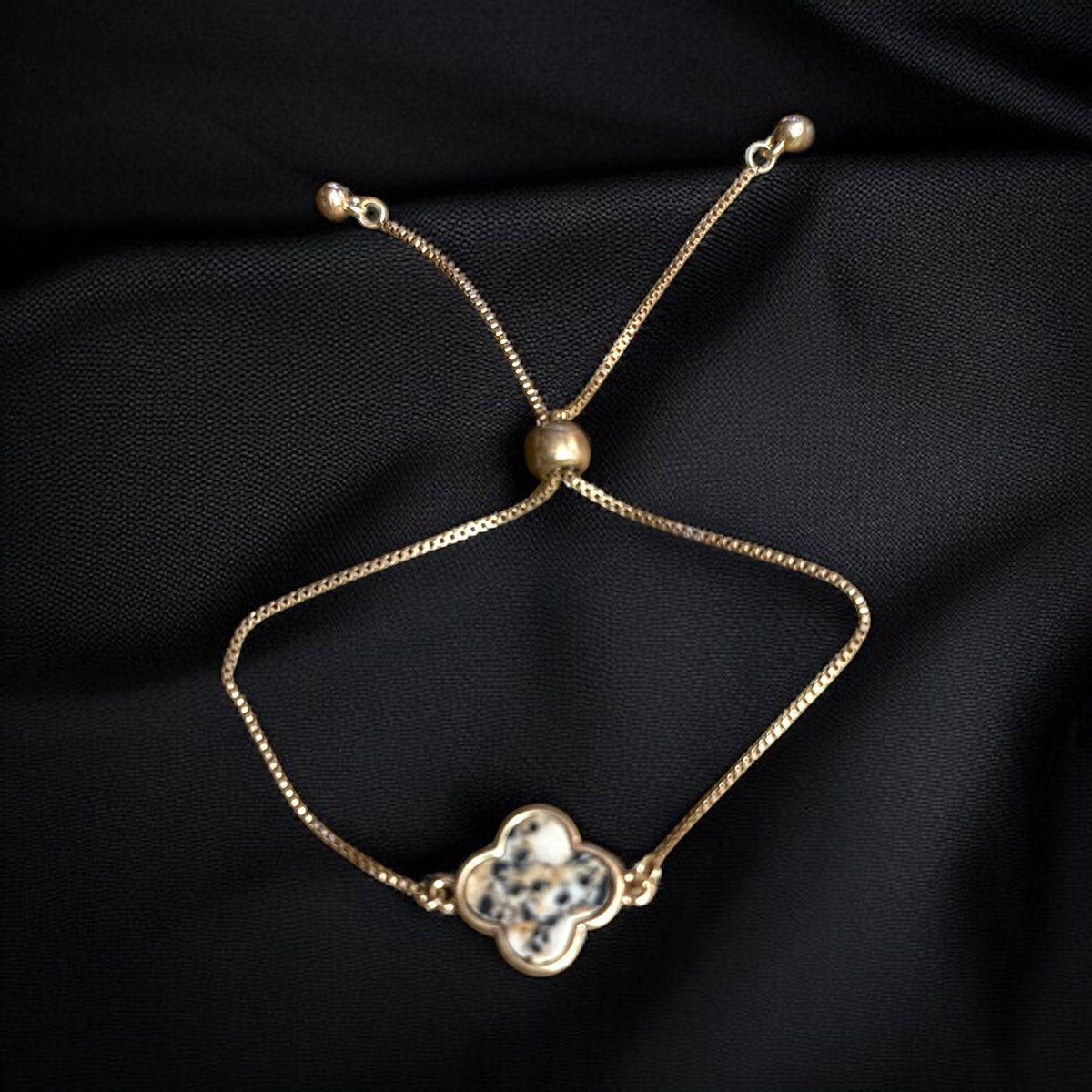 Other Gold tone black and white blotchy clover bolo bracelet Size ONE SIZE - 1 Thumbnail