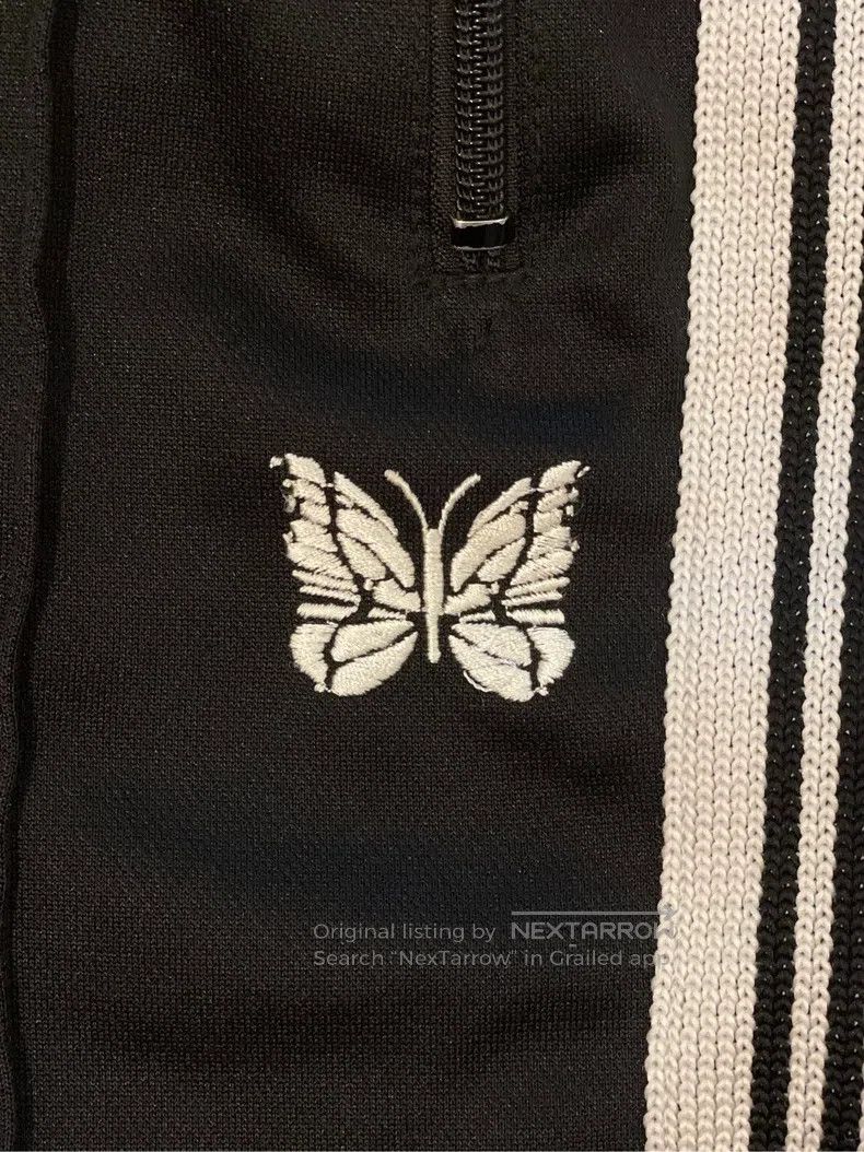 Needles Needles size XS Black and white striped butterfly embroider Size US 39 - 3 Thumbnail