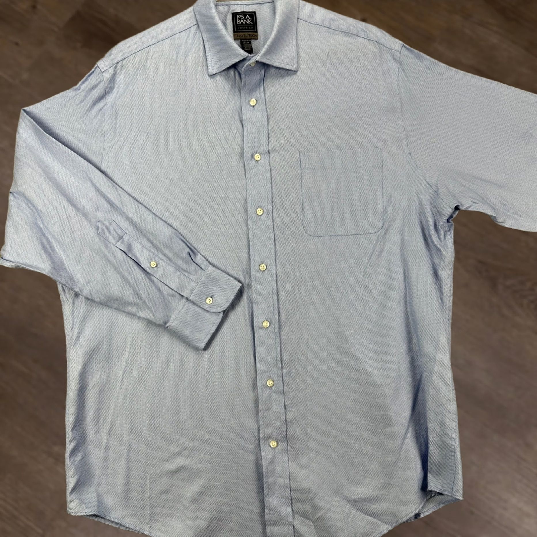 Jos. A. Bank Jos. A. Bank Traveler Shirt Dress Men 17.5-34 Blue Travel Tech Button Up Stretch Shirt Dress Mens Chest 48 Length 33 Preppy Vintage: No Size 48R - 1 Thumbnail