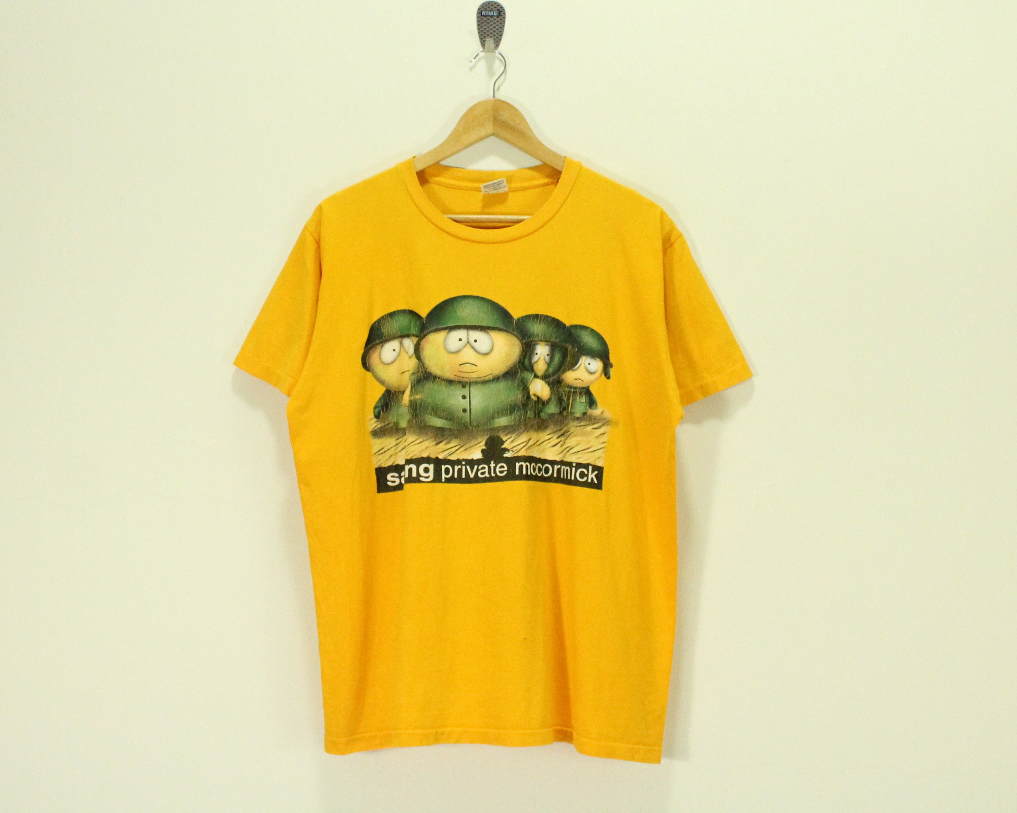image of Humor x Movie Vintage Saving Private Mccormick T Shirt South Park in Yellow, Men's (Size Large)