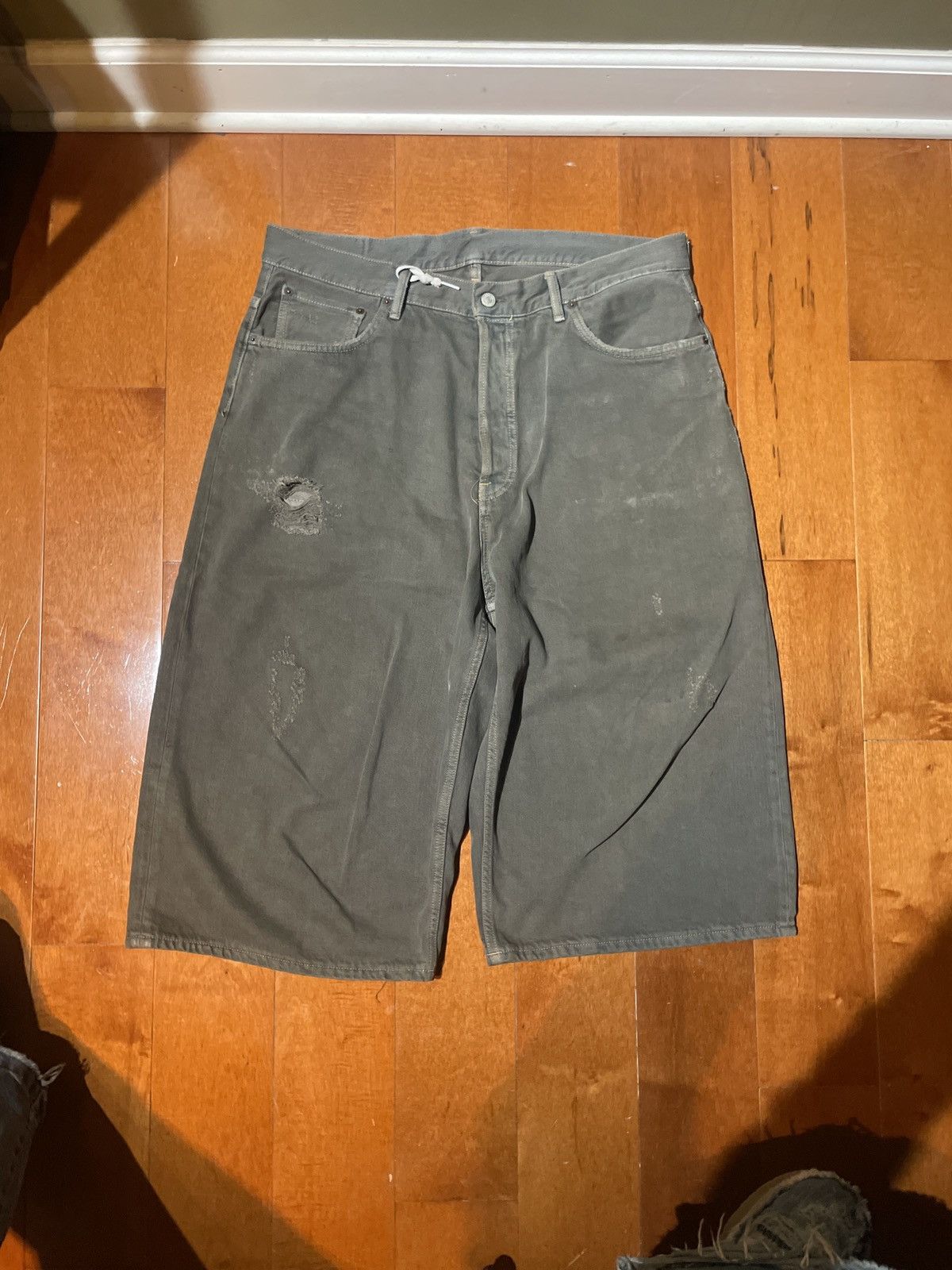 image of Acne Studios Distressed Baggy Jorts in Green, Men's (Size 34)