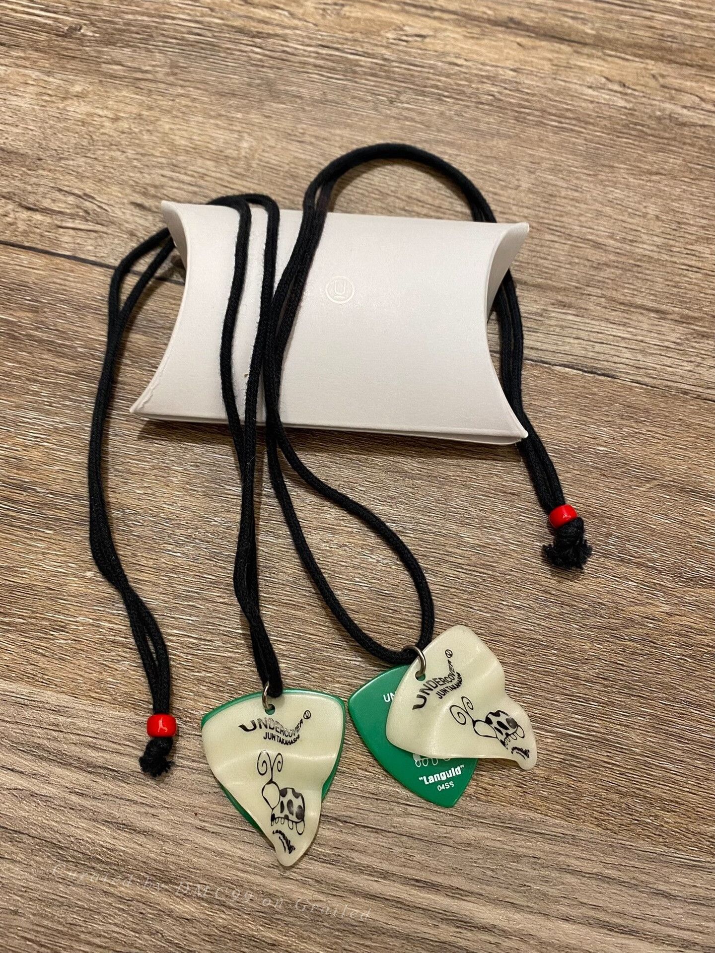 Undercover Guitar Pick Necklace | Grailed