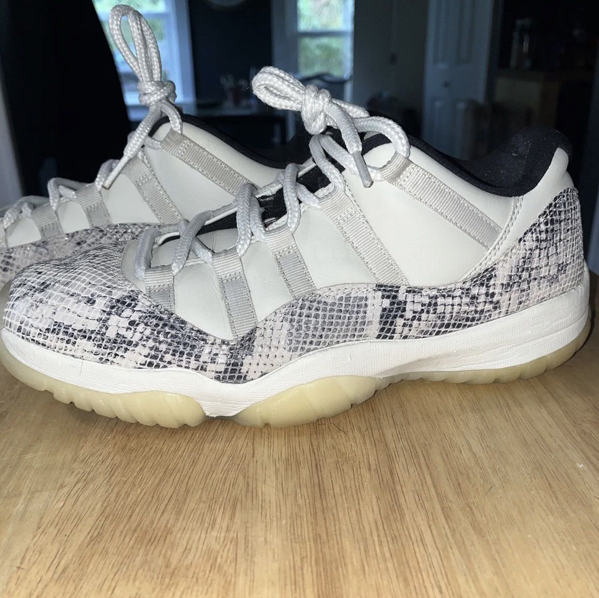 image of Jordan Nike Jordan 11 Retro Low Snakeskin Light Bone Men’S Shoes in White, Men's (Size 9)