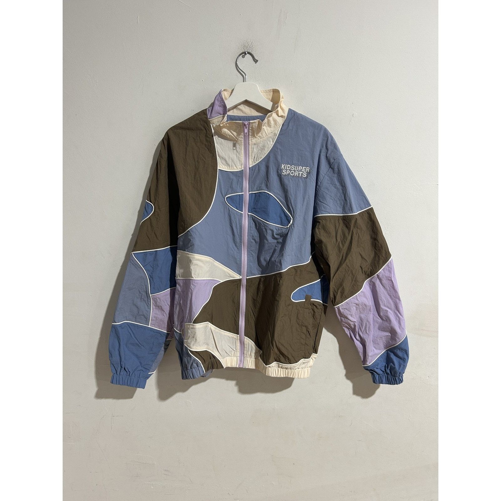 KIDSUPER SS23 WAVY PANELED TRACK JACKET SIZE LARGE PREOWNED