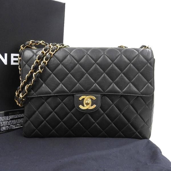 image of Chanel Cc Quilted Leather Flap Bag in Black, Women's