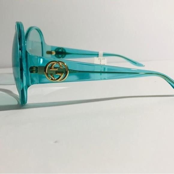 Gucci GUCCI GG0954S 001 Prestige Light Blue Sunglasses","descripti Size ONE SIZE - 11 Thumbnail