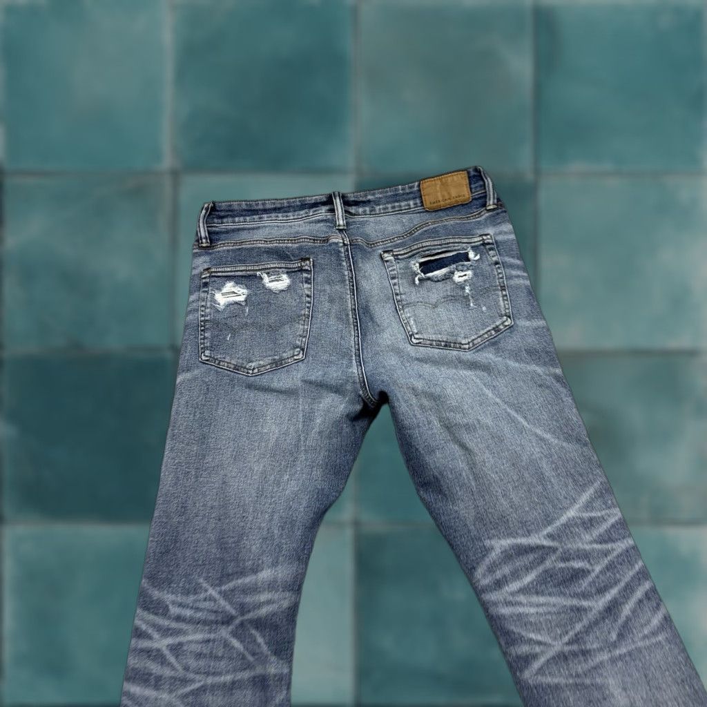 American Eagle Outfitters American Eagle Outfitters Jeans Athletic Skinny 34x34 Denim Blue Distressed AirFlex Modern Camouflage Mens Jeans Shirt? Size US 34 / EU 50 - 1 Thumbnail