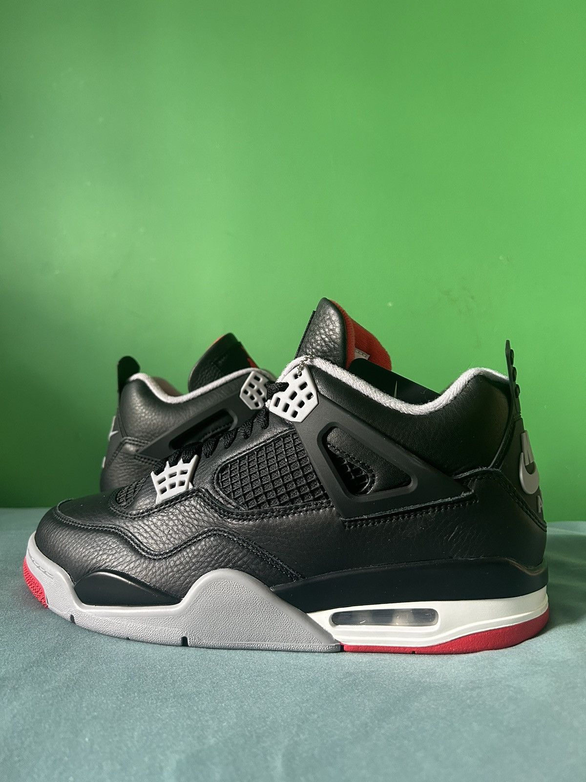 image of Nike Air Jordan 4 Bred Reimagined 2024 Shoes in Black, Men's (Size 10)