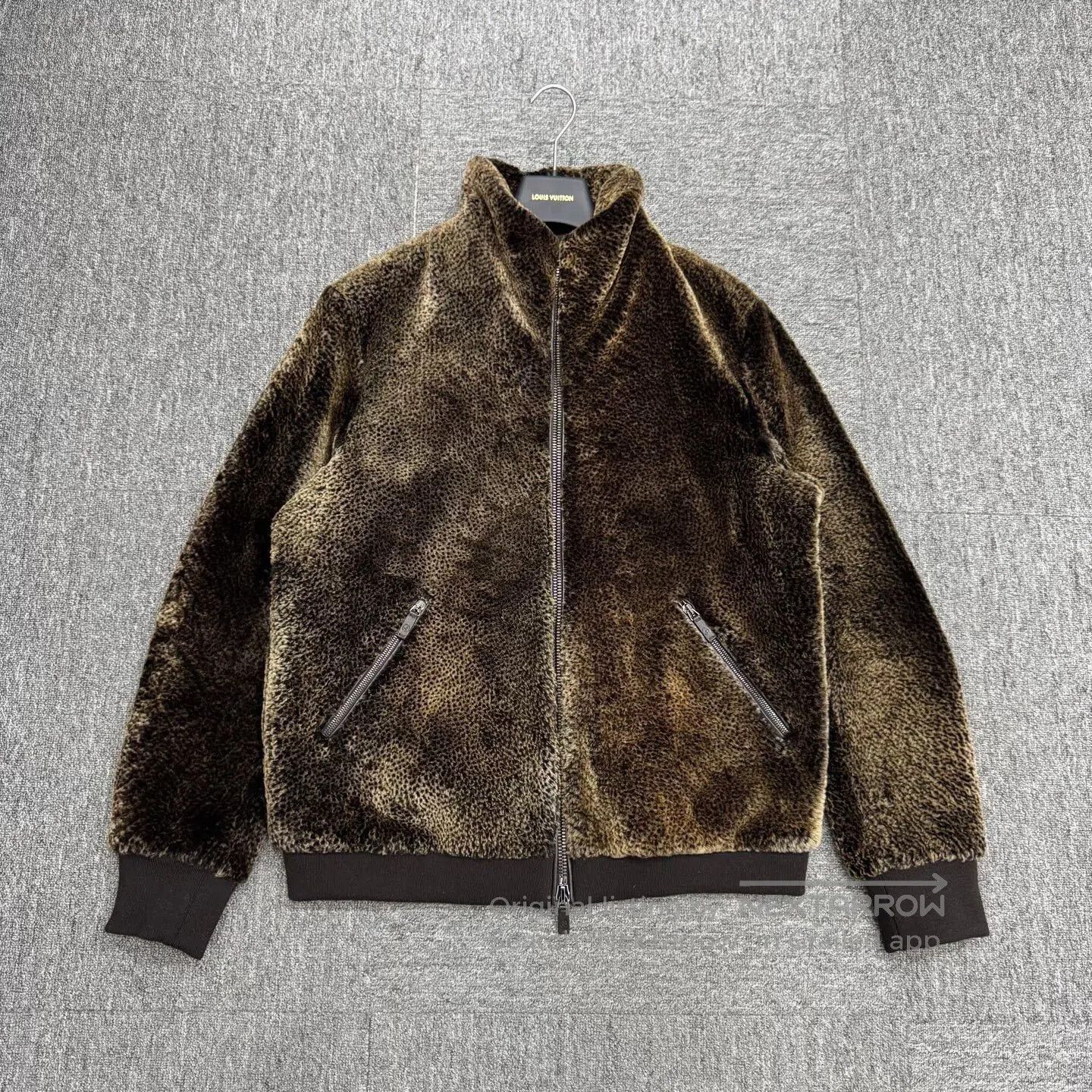 luxurious brown shearling jacket by armani.