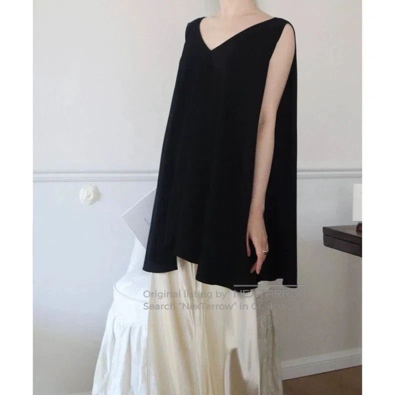 The Row Black Label Cape Top.