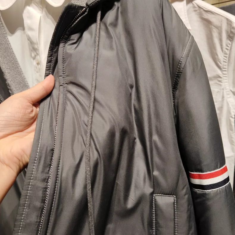 Thom Browne A striped down jacket with a hat