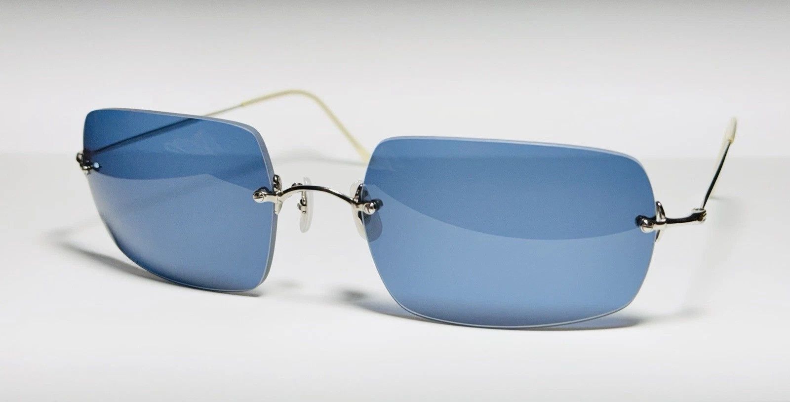 Brad Pitt Oliver Peoples Blue Rimless Oliver Peoples Sunglasses