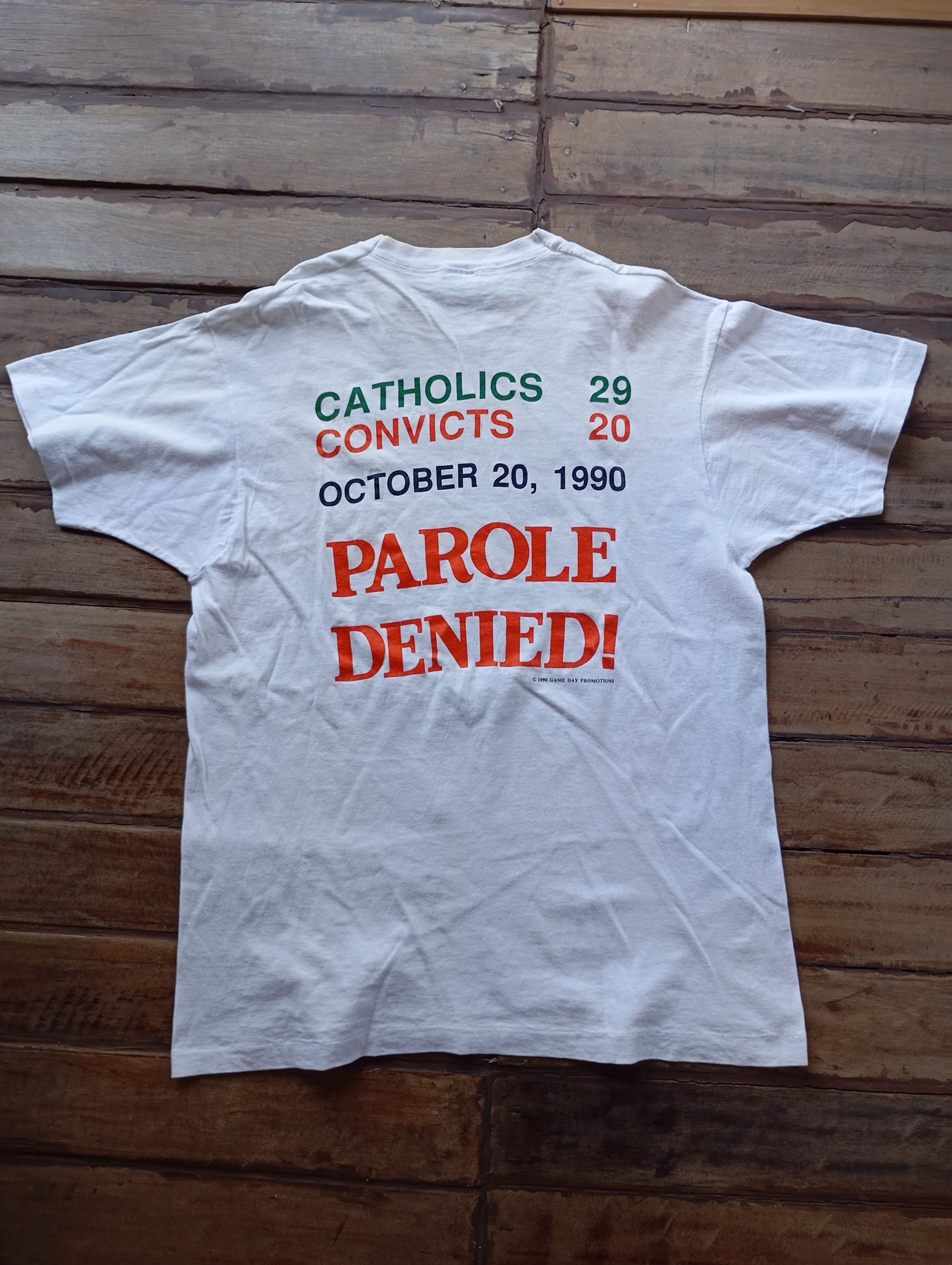 Vintage Vintage 1990 Miami/Notre Dame Catholics vs Convicts t-shirt Size US L / EU 52-54 / 3 - 6 Thumbnail