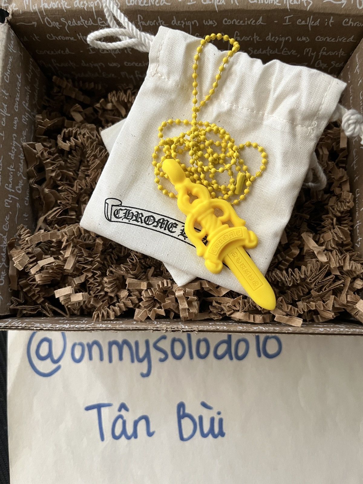 image of Chrome Hearts Silichrome Dagger Pendant in Yellow, Men's