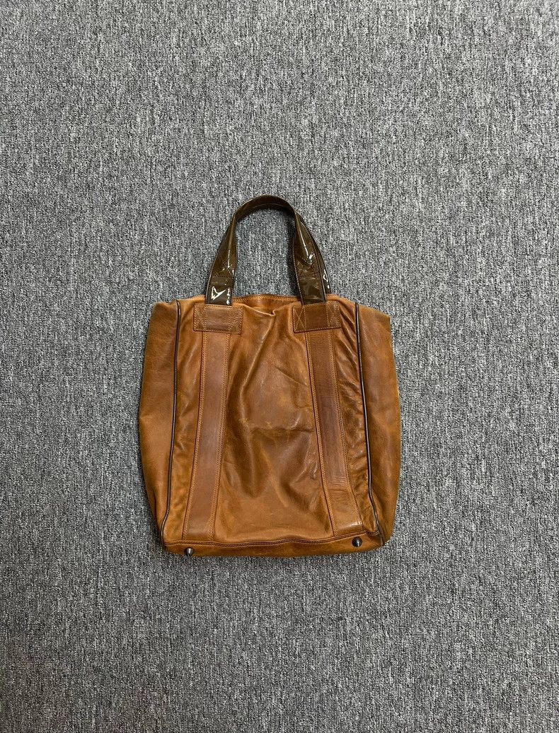 Dries van noten Make an old cowhide handbag