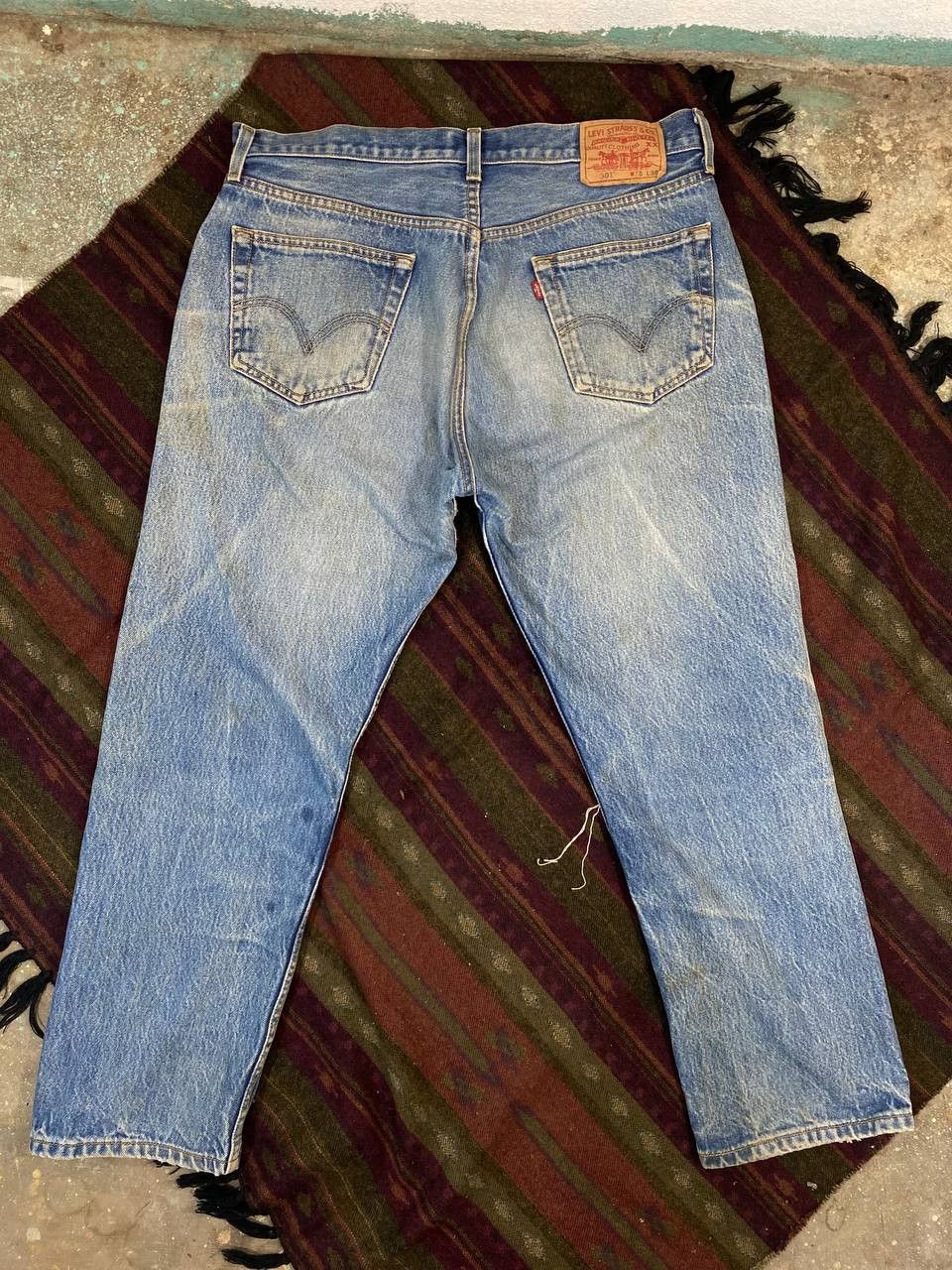vintage levis 501 straight leg button fly distressed denim