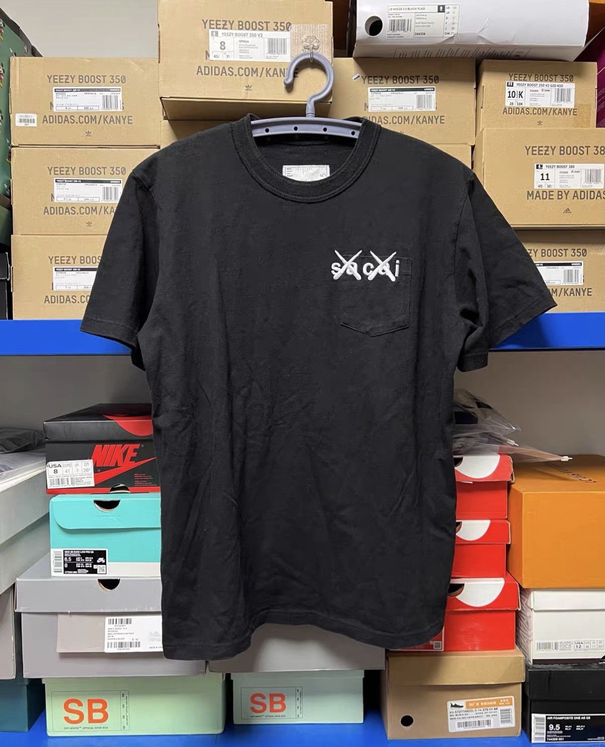 Sacai Sacai x KAWS Embroidered Logo T-shirt J42 | Grailed