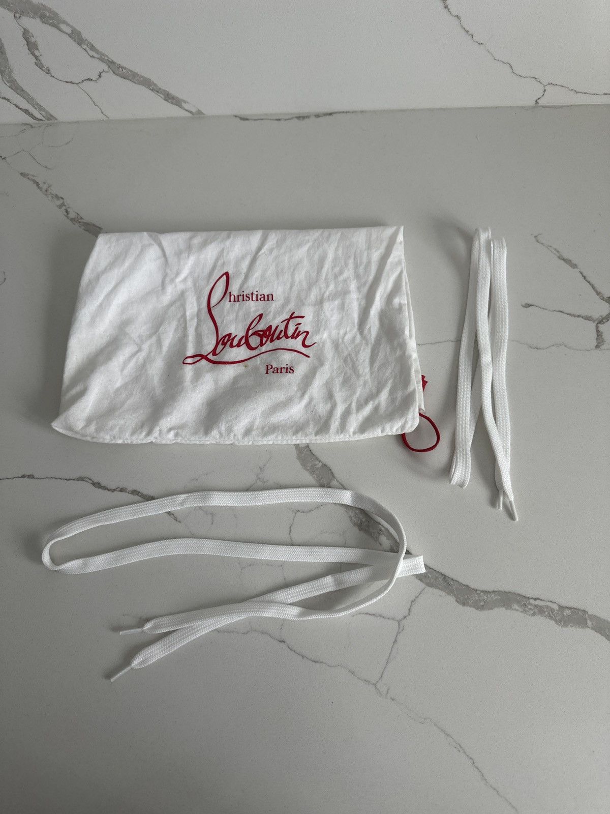 Store Louboutin dust bag