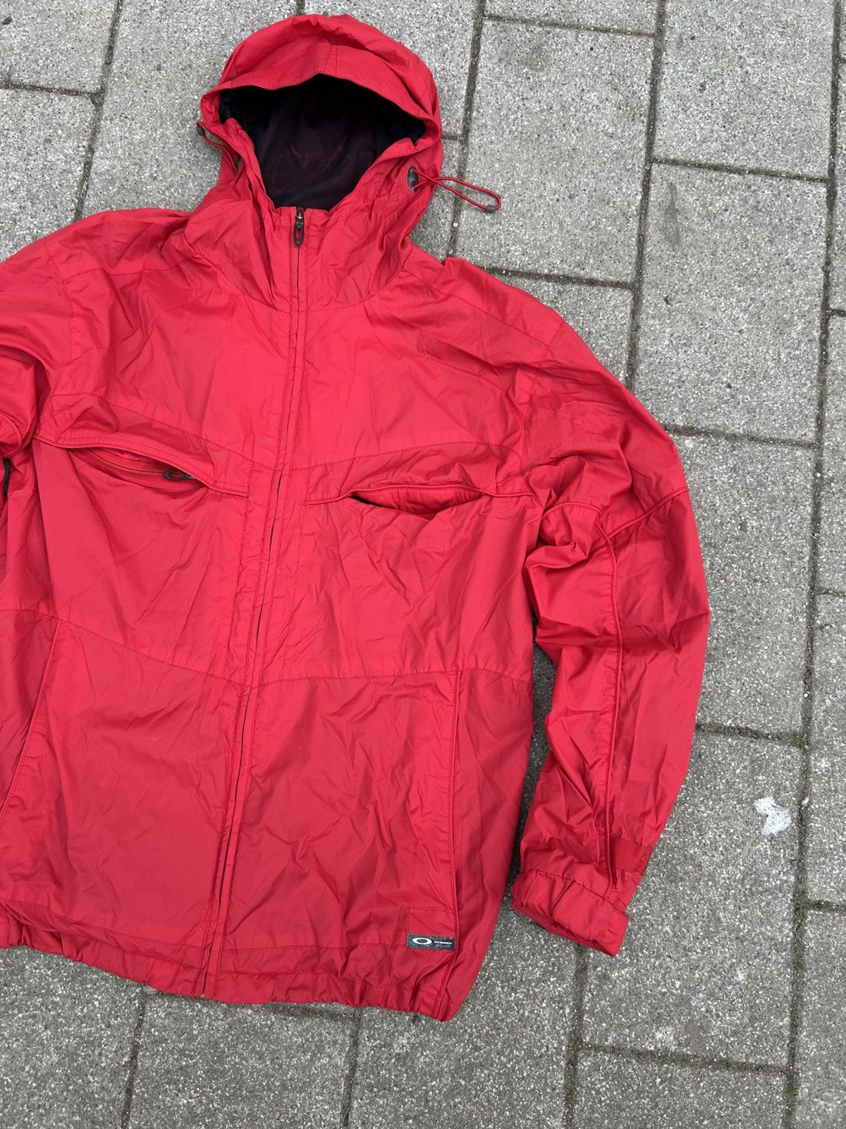 Oakley Oakley Vintage red Hooded Windbreaker Jacket Nylon Jacket Size US L / EU 52-54 / 3 - 4 Thumbnail