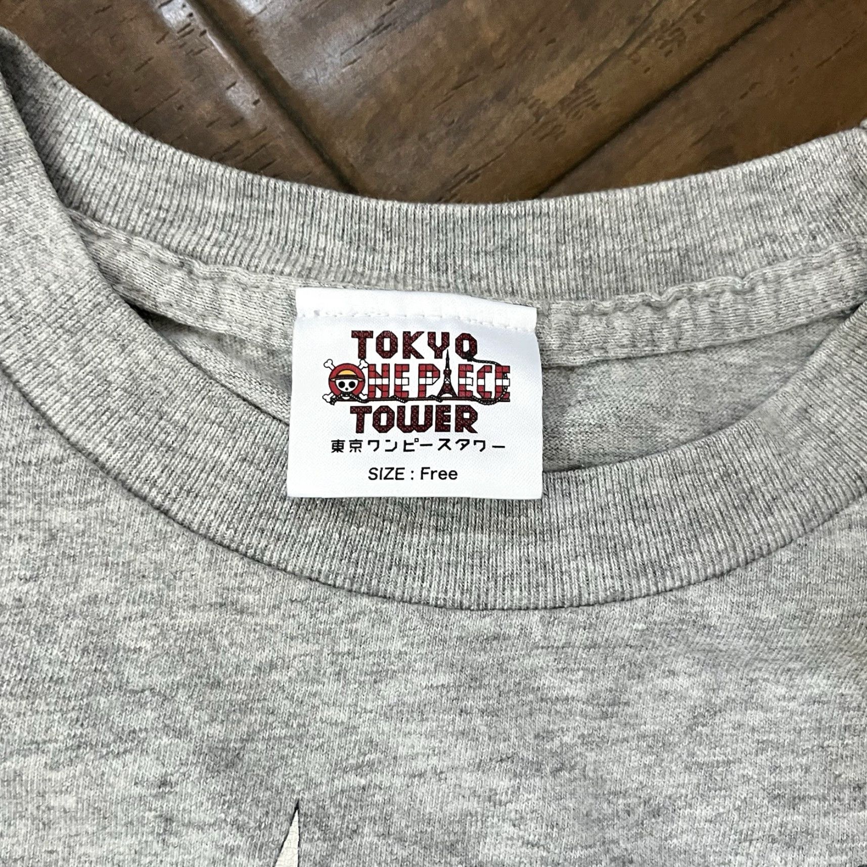 Vintage VINTAGE One Piece Shirt Men S Gray Short Sleeve Tokyo Tower Treasure Bag Big Pirate JPN Mugiwara Store Limited Anime Fan Merch Mens Size US S / EU 44-46 / 1 - 2 Thumbnail