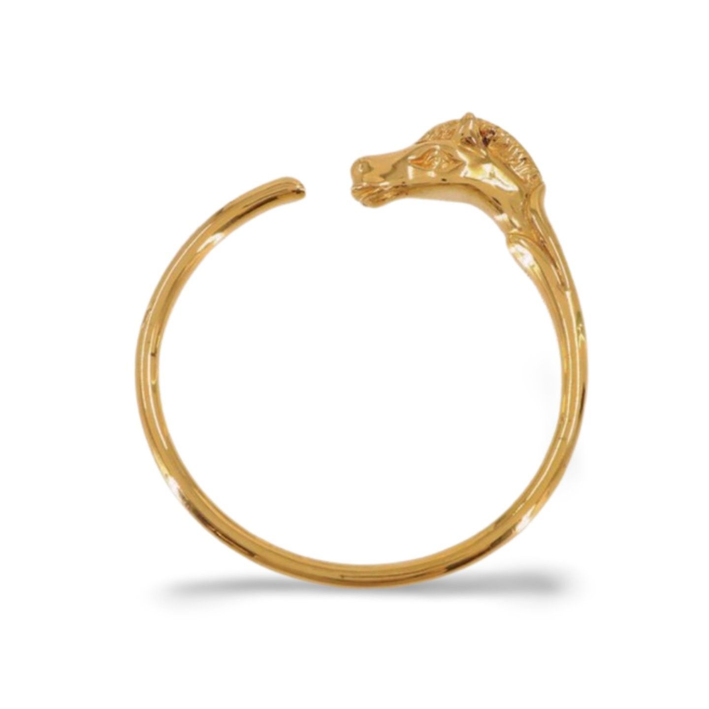 Vintage Hermes golden horse head design bangle bracelet.