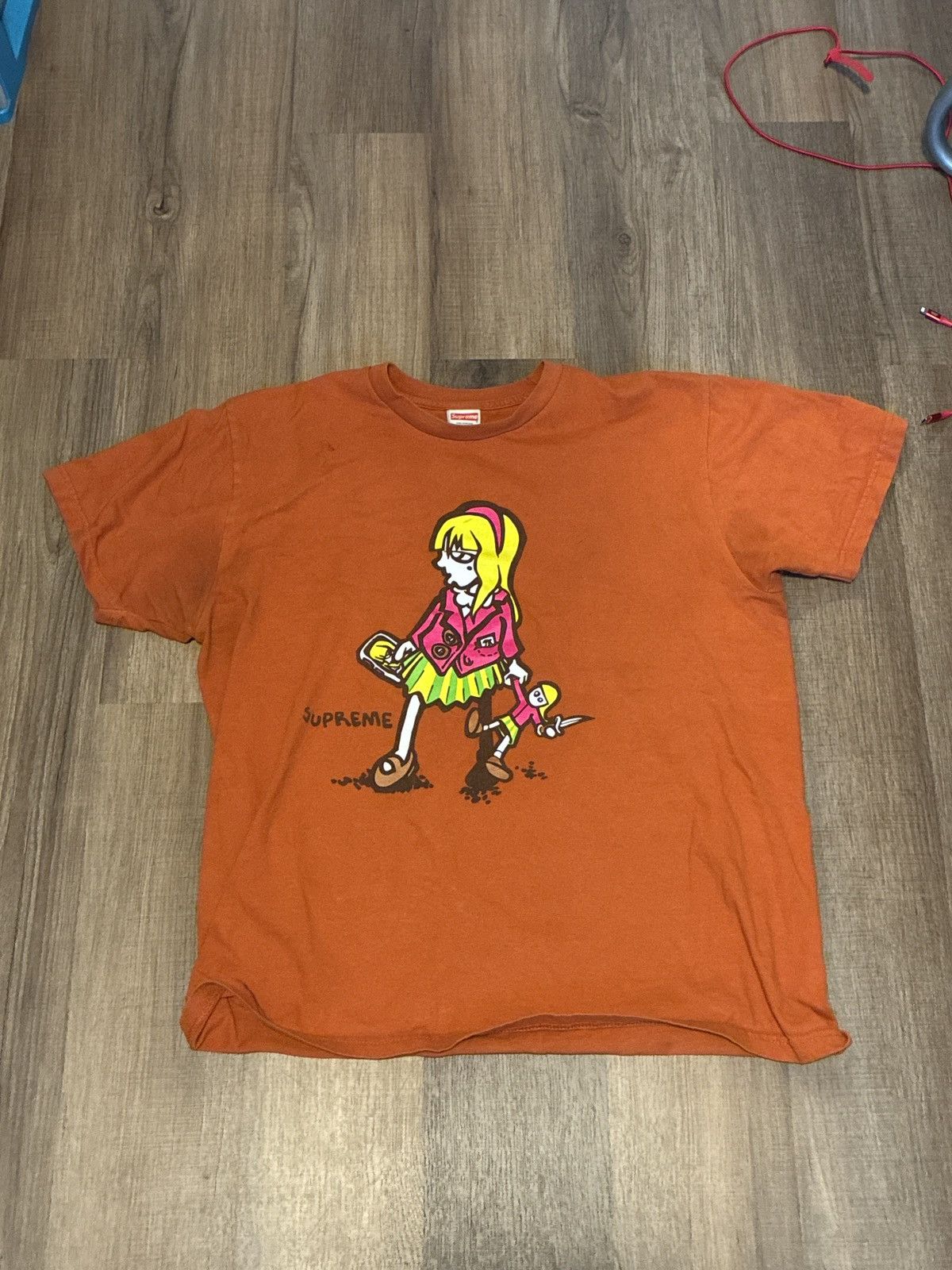 Large supreme suzie switchblade tee