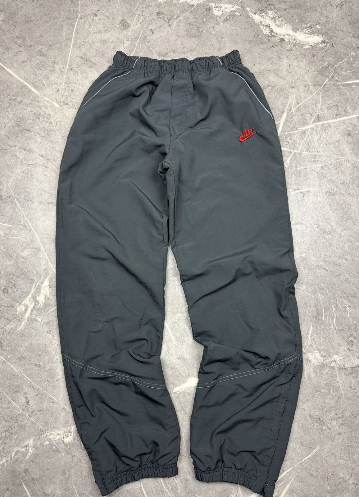Nike Nike Track Pants Dark Grey / Red | Baggy | Size S (fits M) Size US 32 / EU 48 - 1 Thumbnail