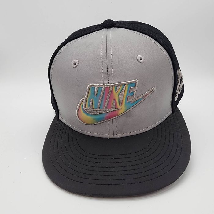white nike hat with black swoosh