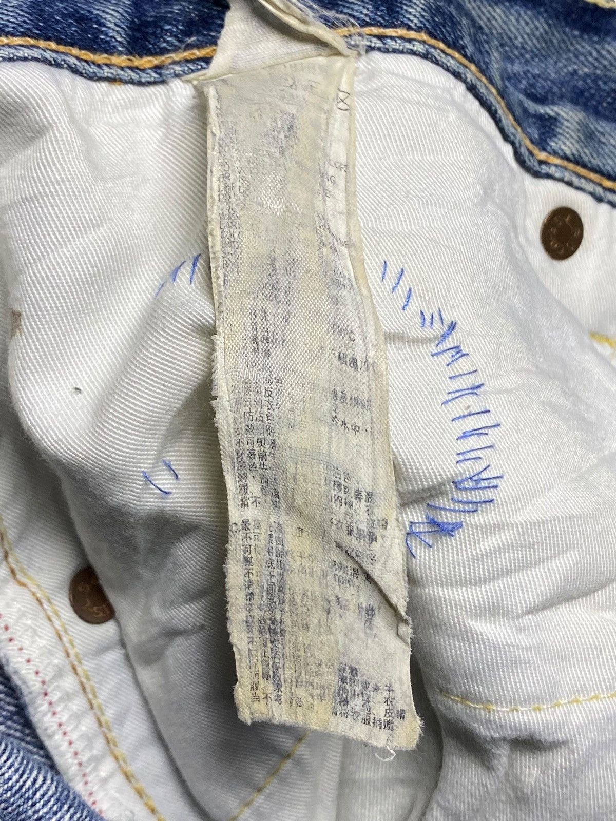 Vintage Levis 502 Blue Wash Ripped Straight Jeans