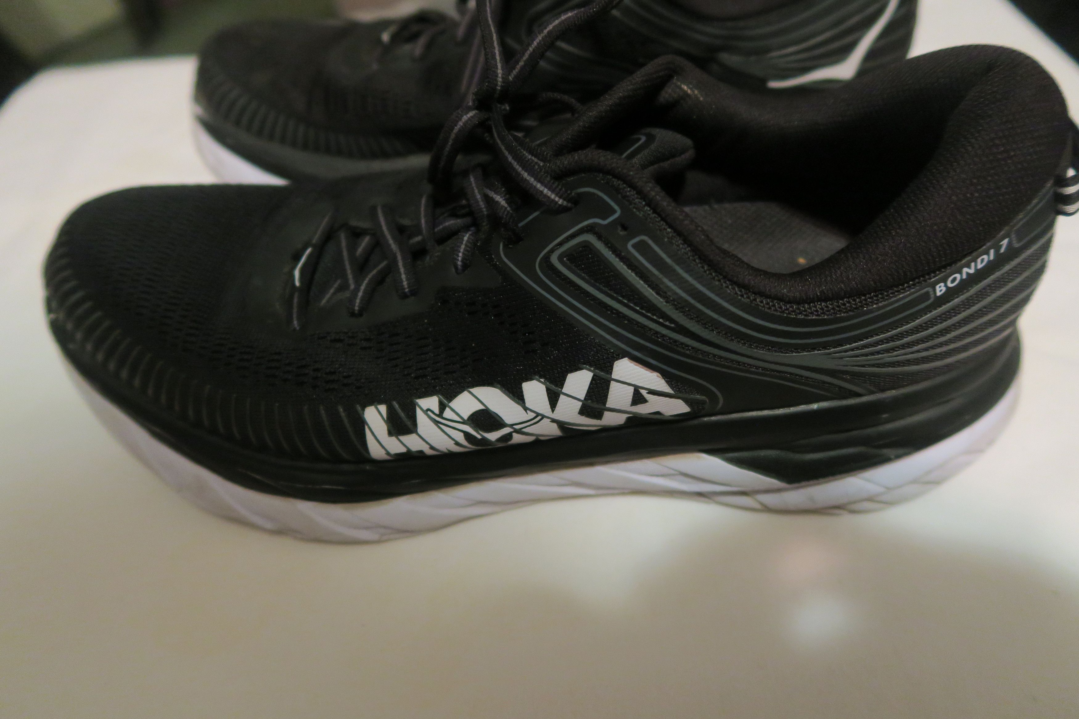 Hoka Hoka One One Mens Bondi 7 Running Shoes Black White Size US 10 / EU 43 - 1 Thumbnail