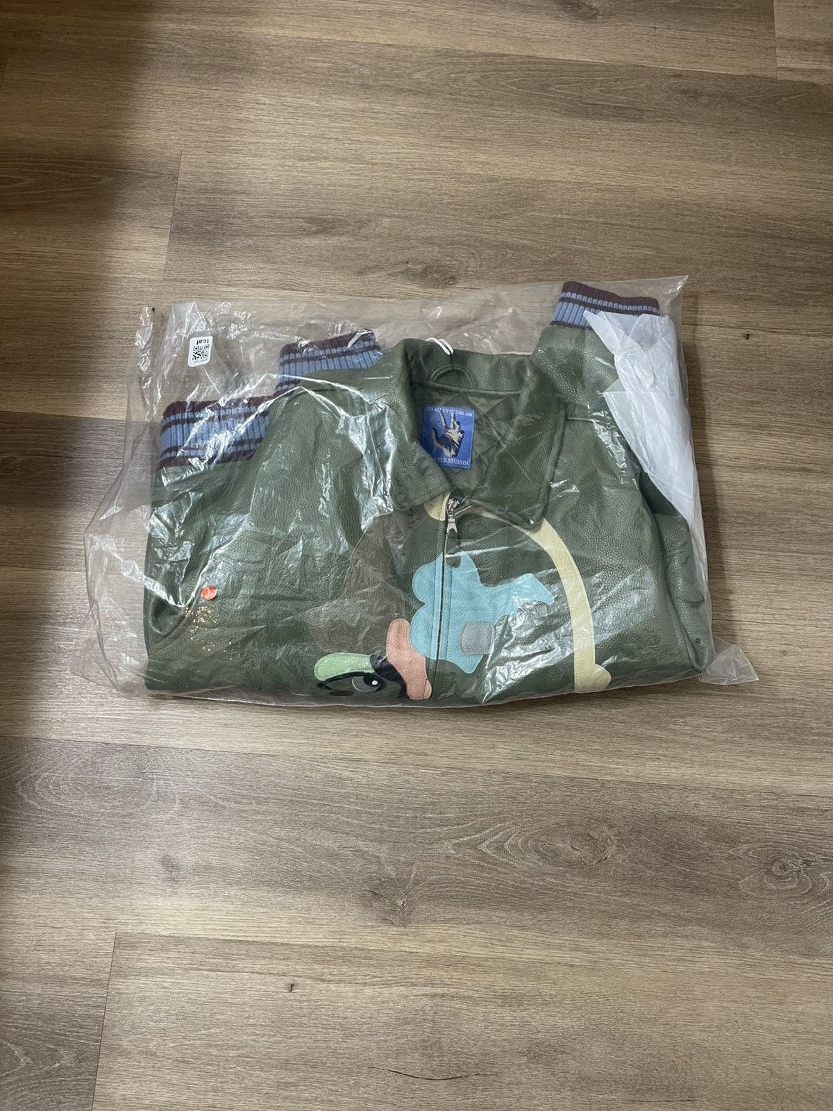 KidSuper PATCHWORK FACE LEATHER VARSITY JACKET [GREEN] Size US L / EU 52-54 / 3 - 7 Thumbnail