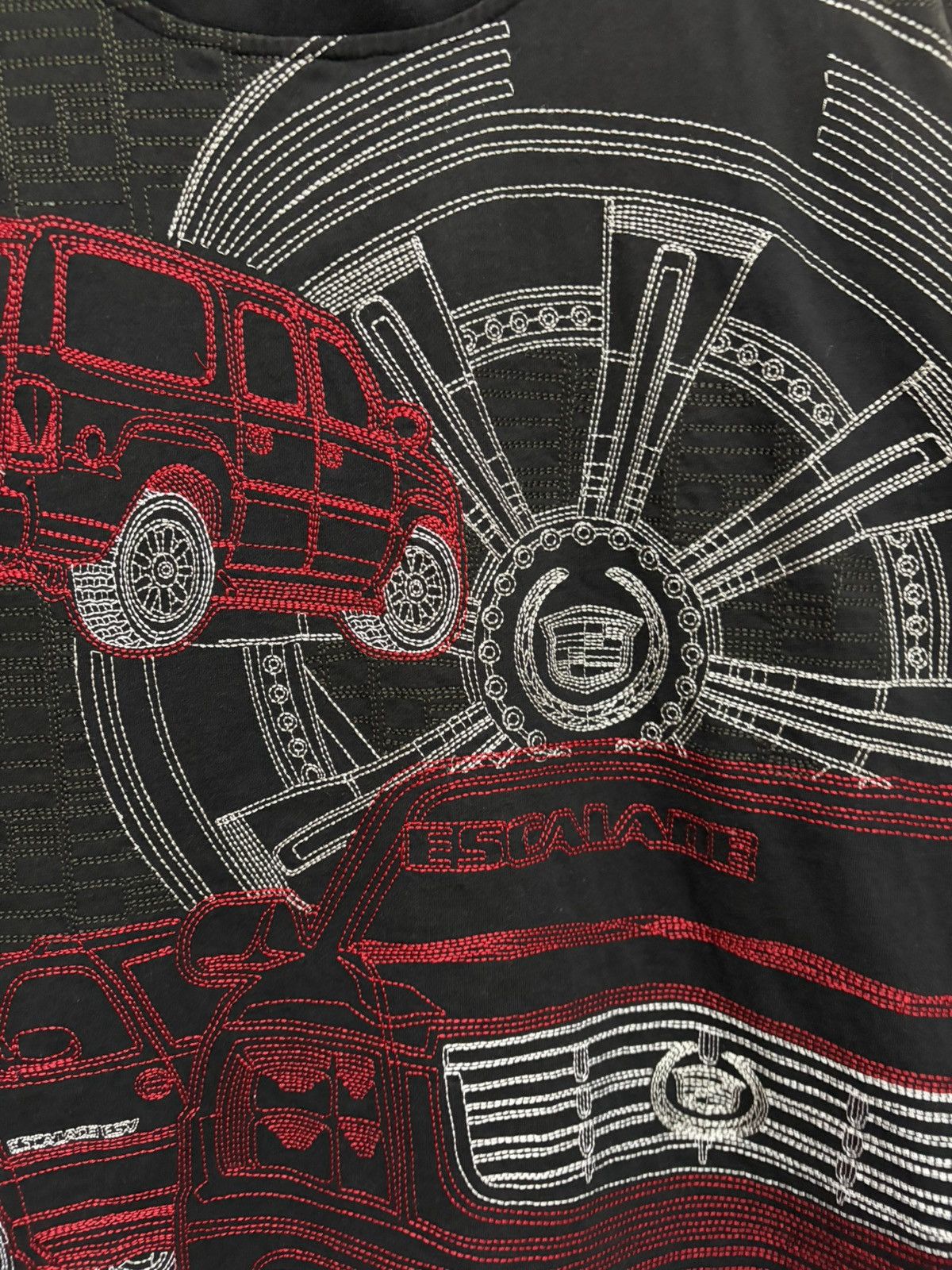 Pelle Pelle RARE 🔥 PELLE PELLE CADILLAC ESCALADE FULL EMBROIDERED BAGGY Size US XXL / EU 58 / 5 - 8 Thumbnail