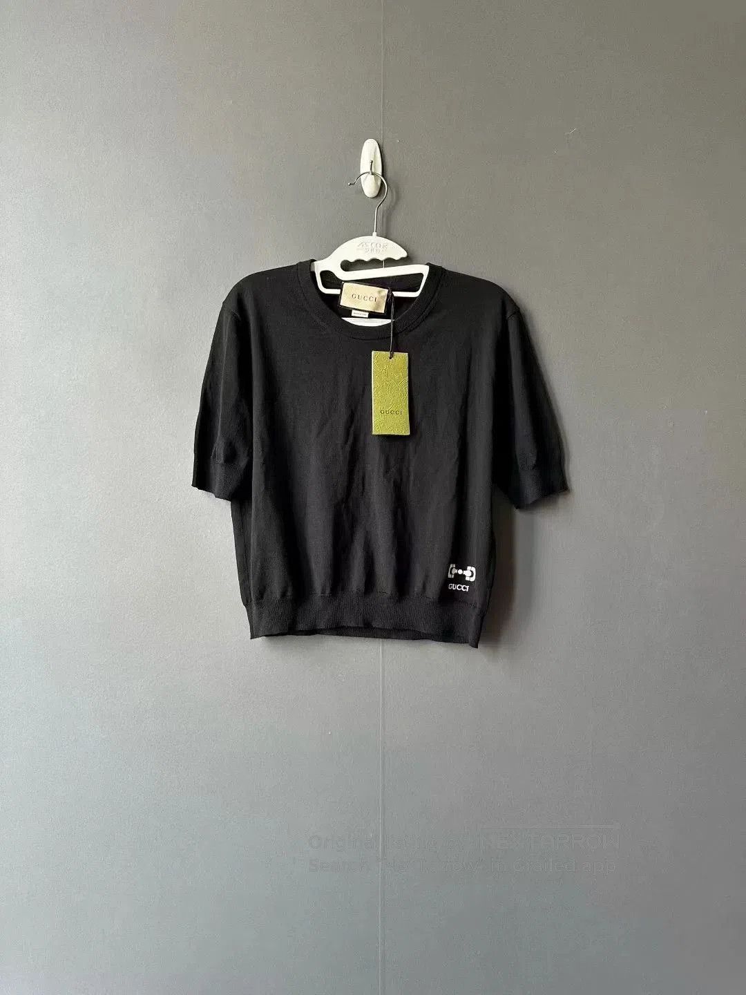 gucci black short sleeve knit sweater.