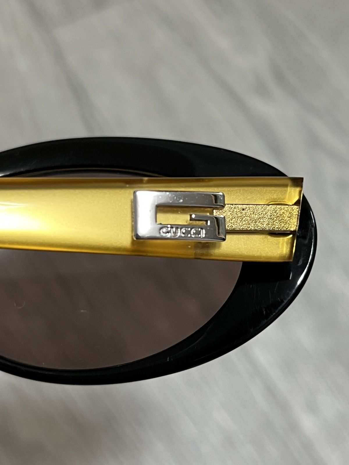 Vintage Gucci Vintage gold sunglasses with black inner temples Size ONE SIZE - 19 Thumbnail