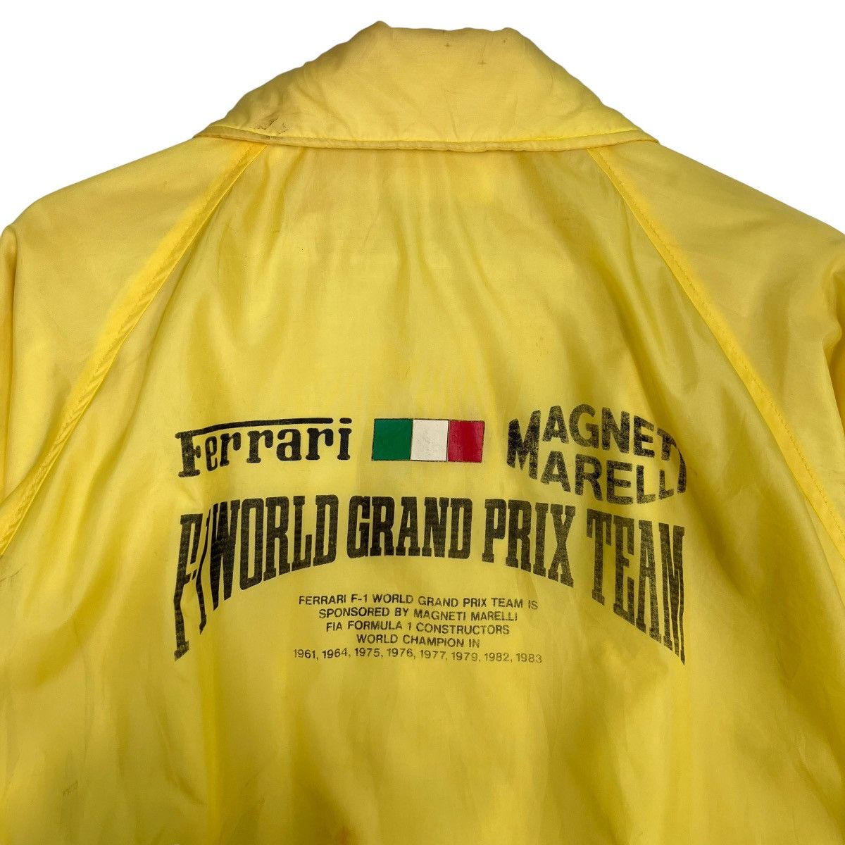 Ferrari 💥 80s VINTAGE FERRARI MAGNETI MARELLI F-1 RACING TEAM Size US L / EU 52-54 / 3 - 8 Thumbnail