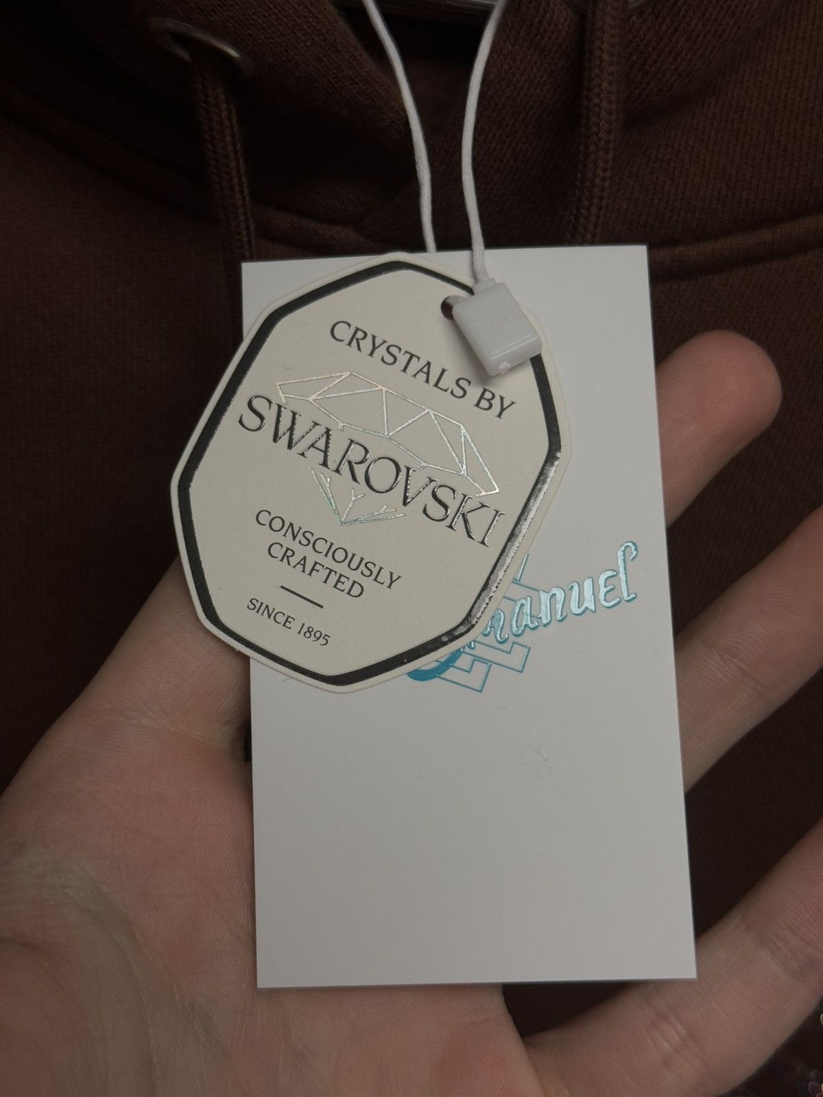 Eric Emanuel × Swarovski Eric Emanuel x Swarovski Crystals Size L Brown (NEW) Size US L / EU 52-54 / 3 - 9 Thumbnail