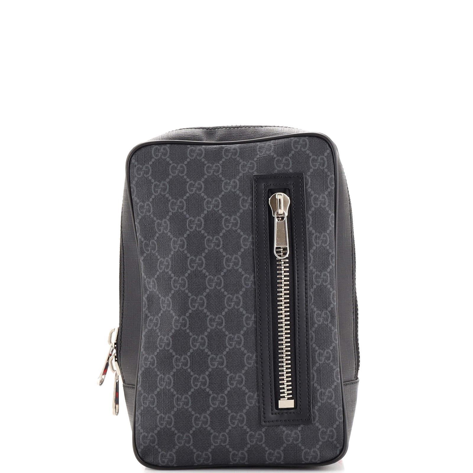 image of Gucci Soft Zip Sling Bag GG Coated Canvas Small in Black, Women's