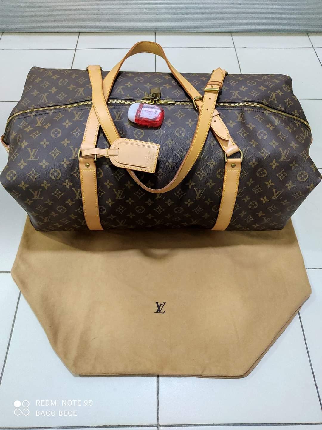 image of Louis Vuitton Monogram Canvas Kabul Garment Bag in Brown, Women's