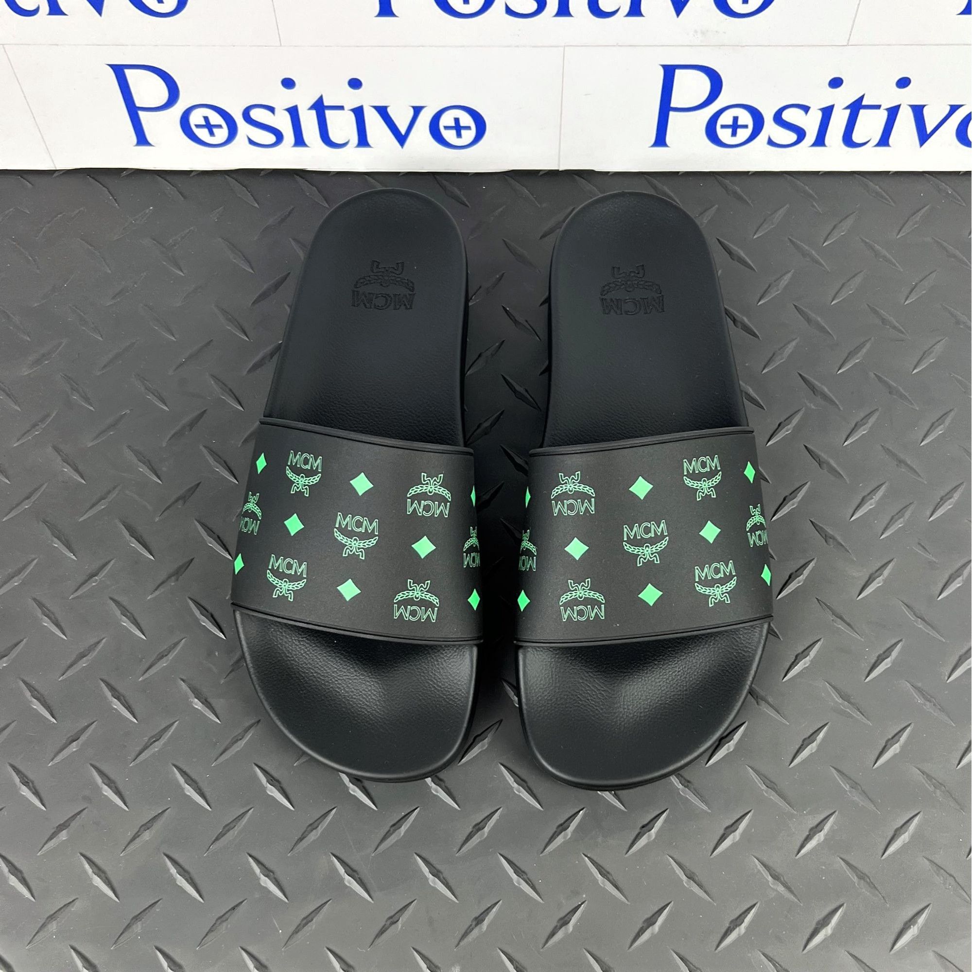 image of MCM Mens Black/green Monogram Print Rubber Slides Us 11
