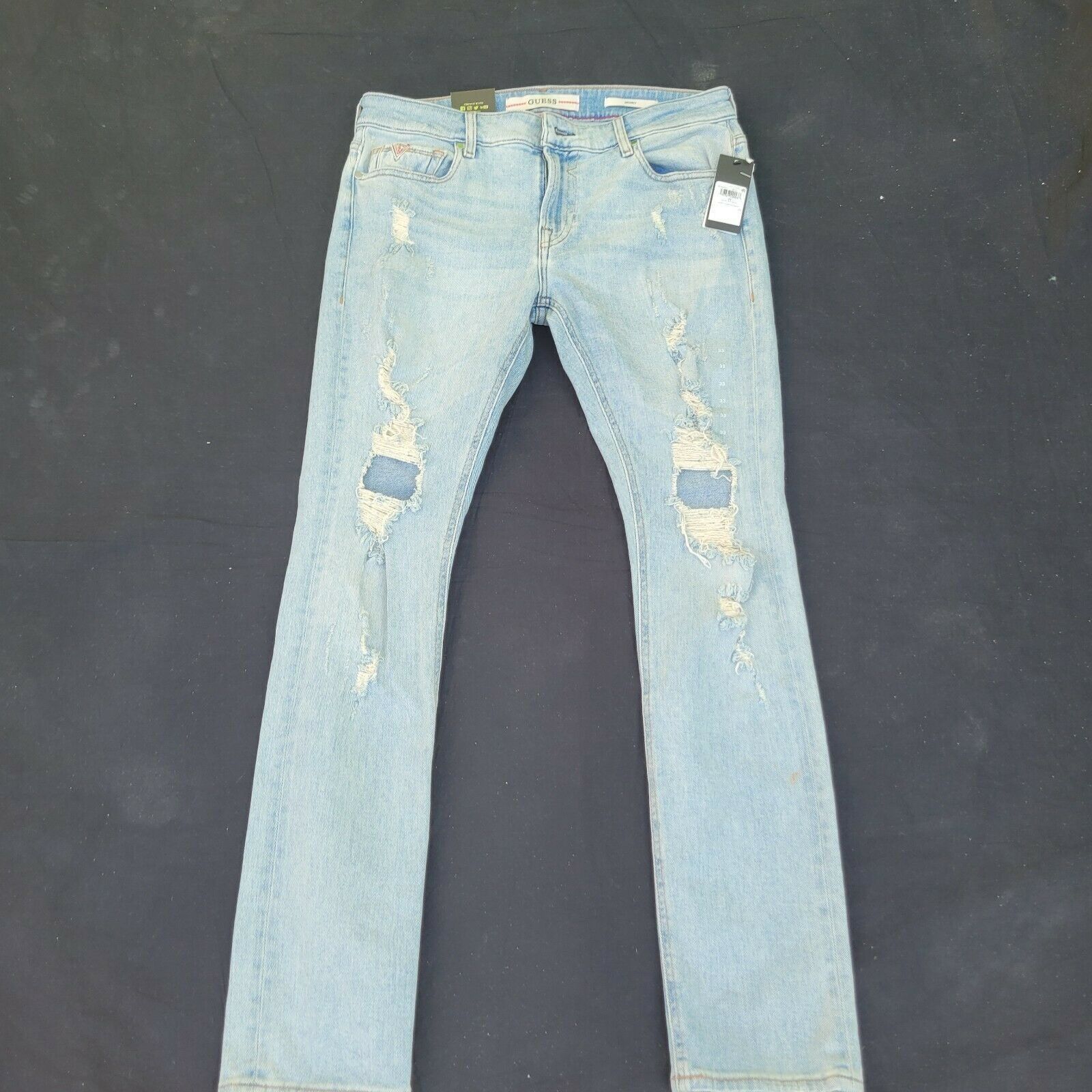 Guess Men's Guess Distressed Skinny Jeans. 33x32. Blue. Size US 33 - 1 Thumbnail