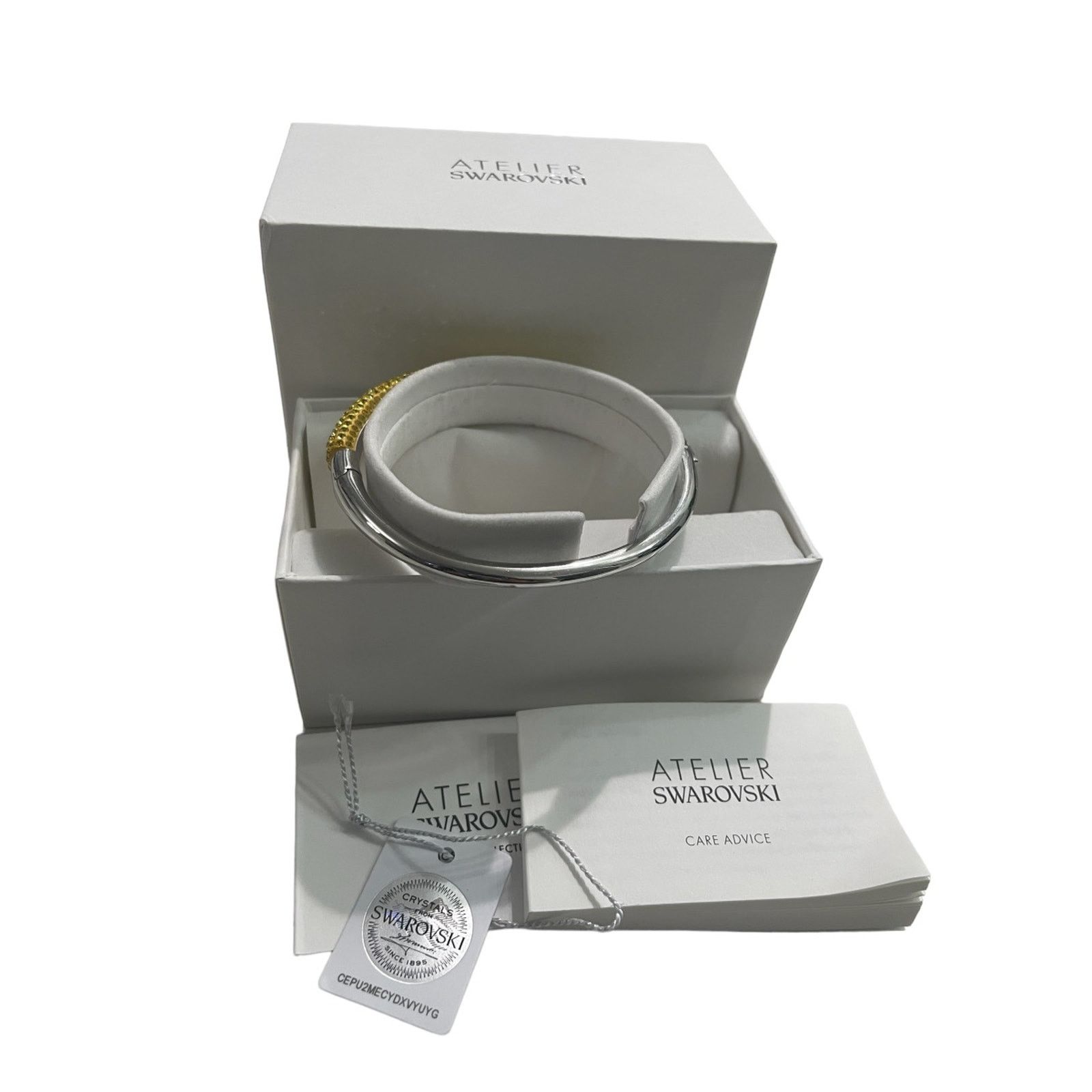 Swarovski Atelier Tigris bangle Yellow, Rhodium plated L