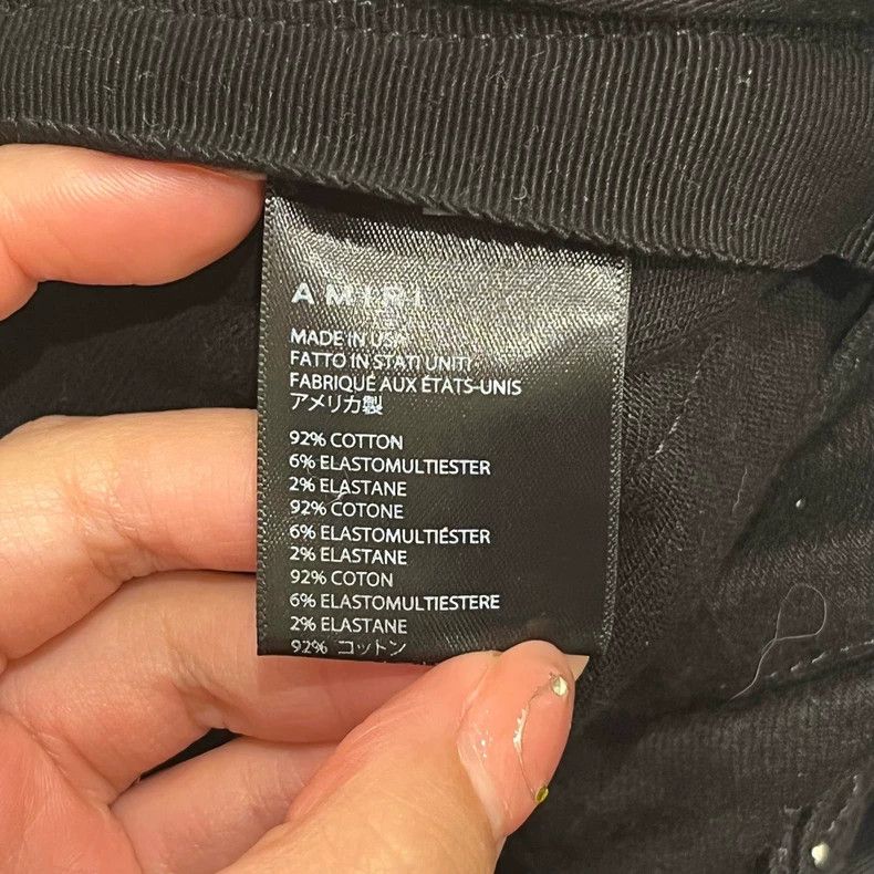 Amiri Amiri Black solid-color distressed knee casual jeans Size US 34 / EU 50 - 6 Thumbnail