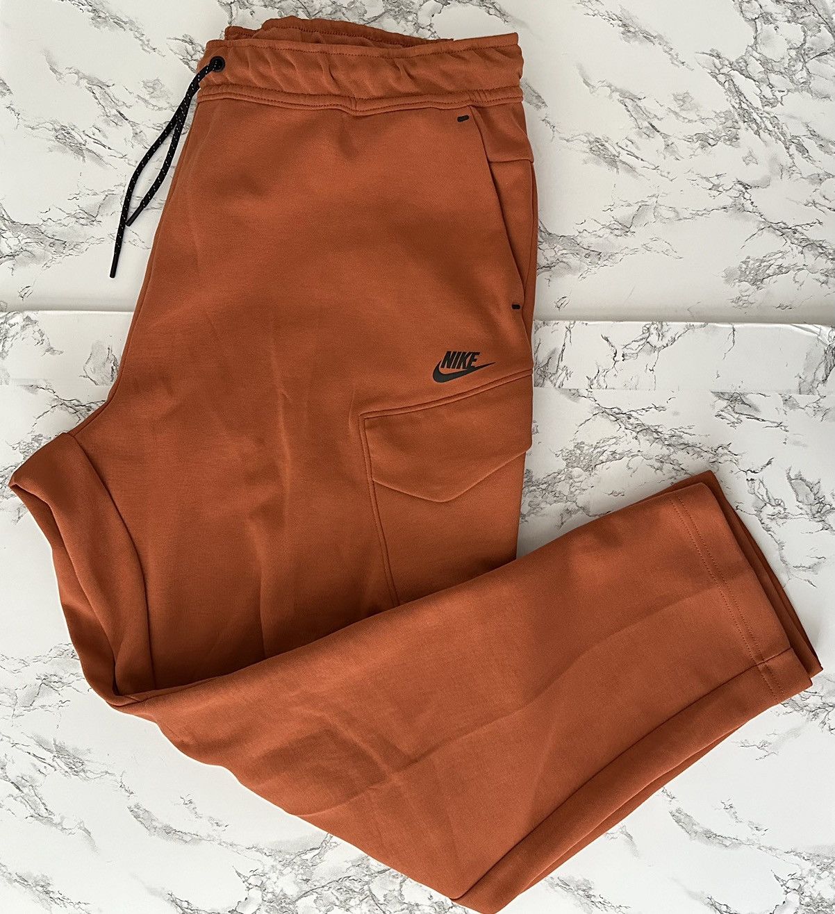 image of Nike Sportswear Tech Fleece Utility Jogger Pants Bronze in Orange, Men's (Size 36)