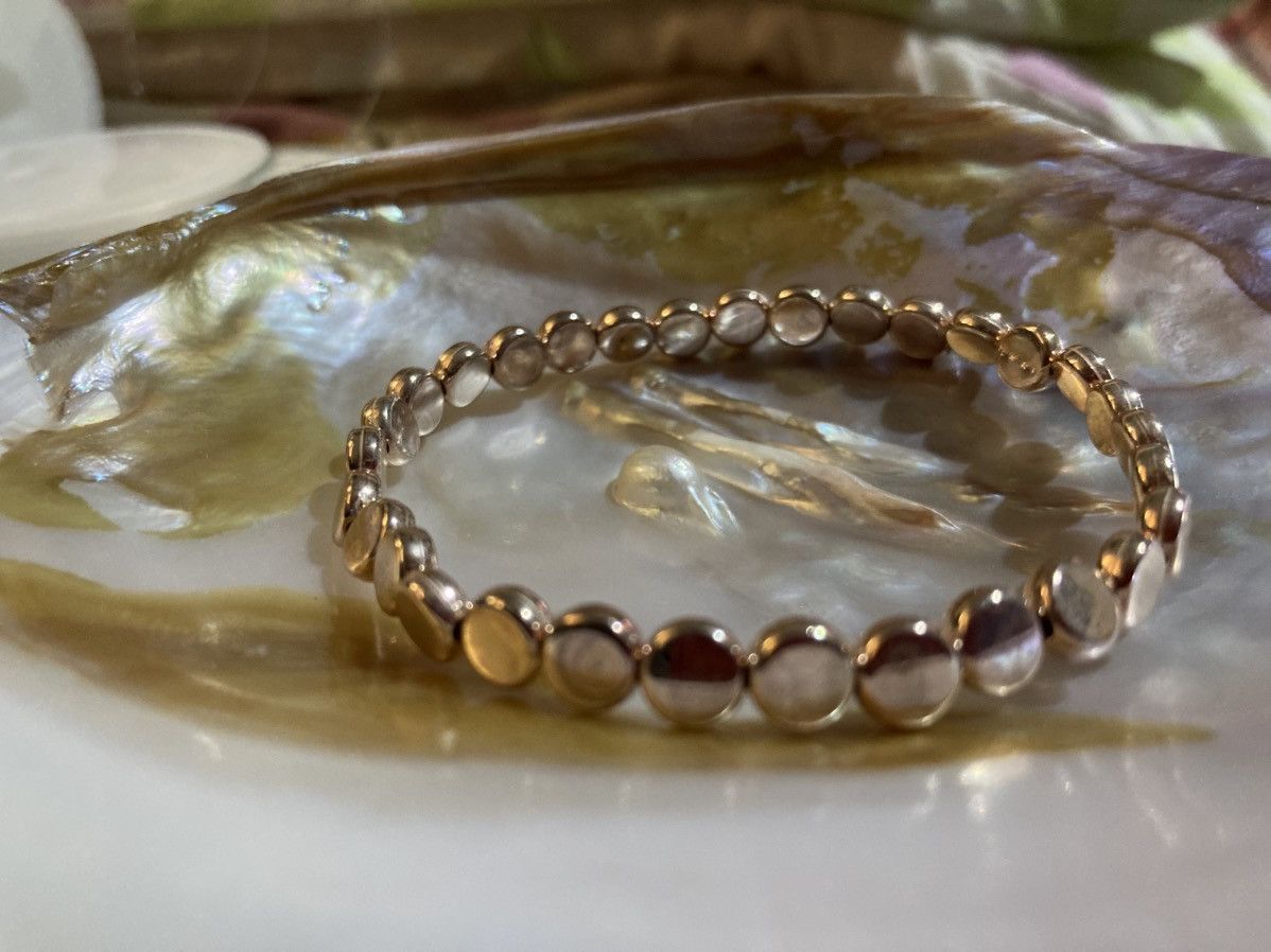 Other Rose gold coloured flat circular beaded bracelet Size ONE SIZE - 1 Thumbnail
