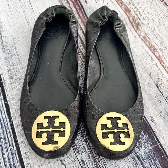Tory Burch Tory Burch Black Leather Embossed Gold Emblem Flats | Grailed