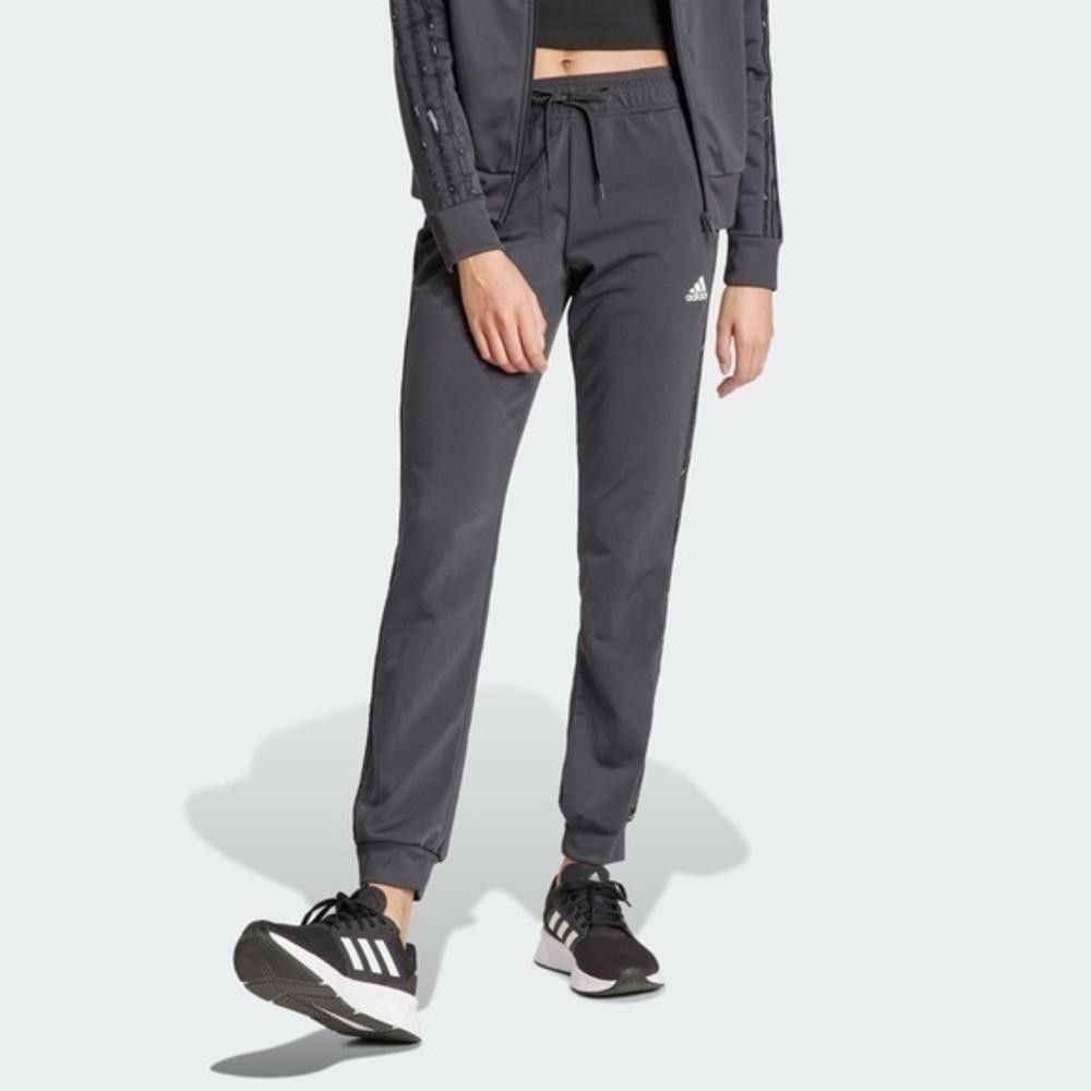 Adidas ESSENTIALS ANIMAL PRINT TRACK PANTS used