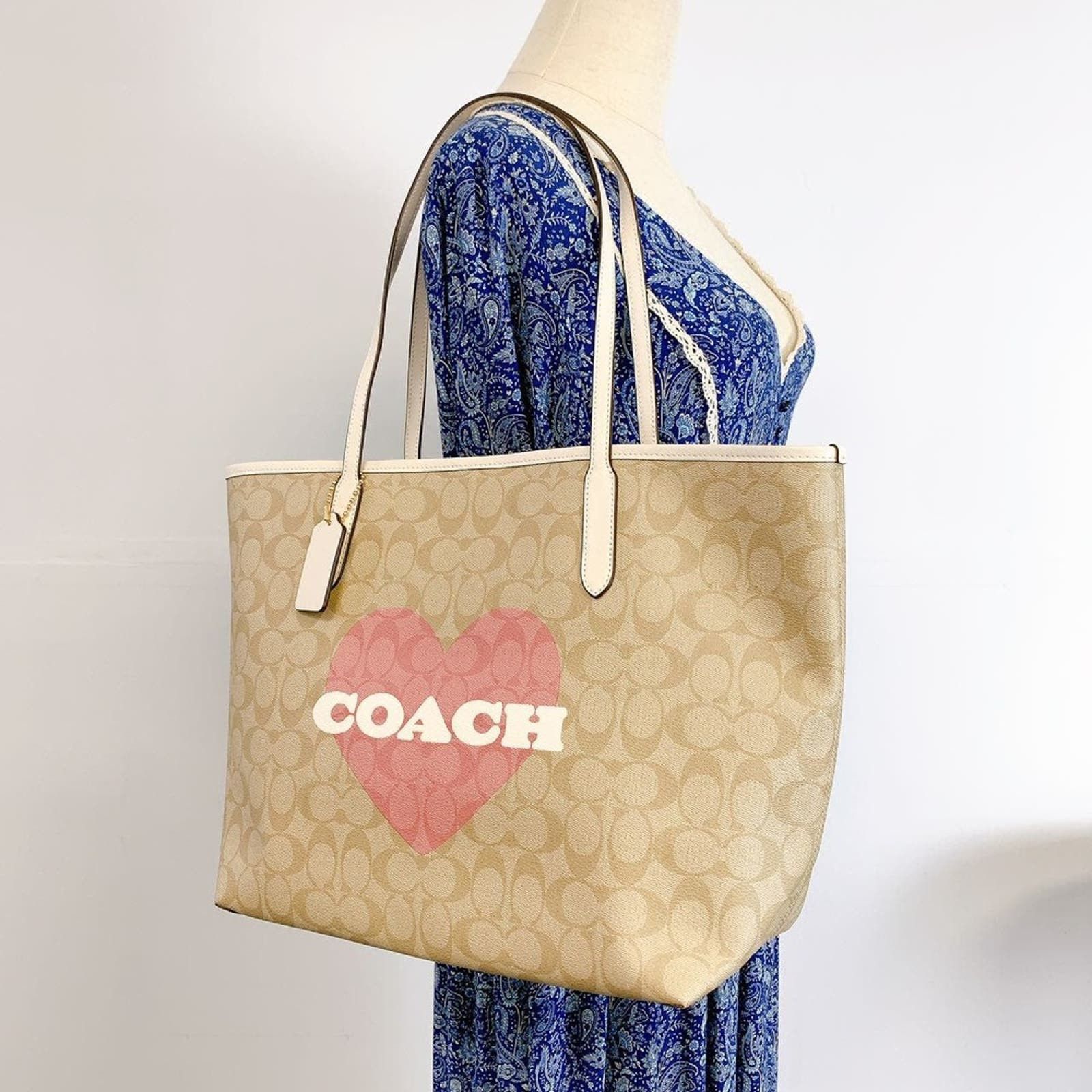 image of Coach Cp052 City Tote In Signature Canvas Light Khaki Chalk in Pink, Women's