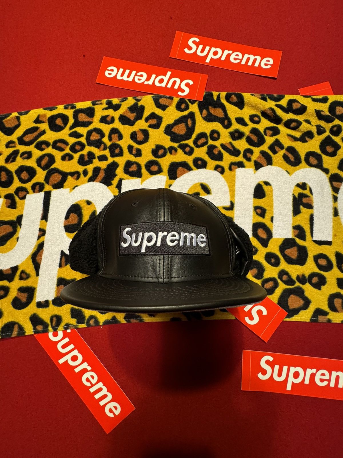 image of Supreme X New Era Box Logo Leather Earflap Fitted Hat in Black, Men's